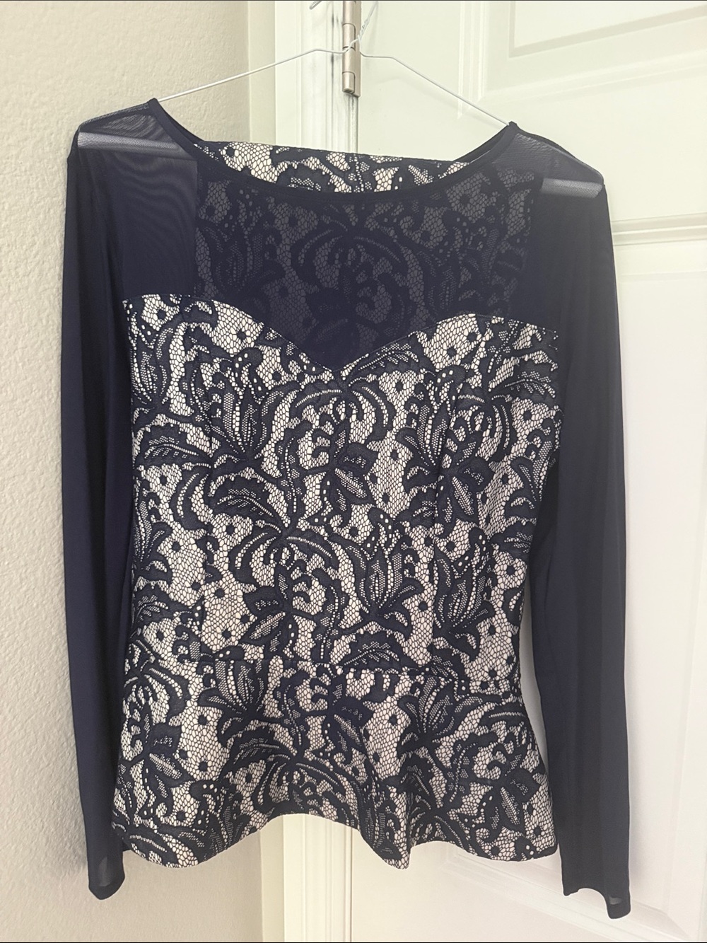 bebe Navy Lace & Mesh Long Sleeve peplum top, with skirt outfit.